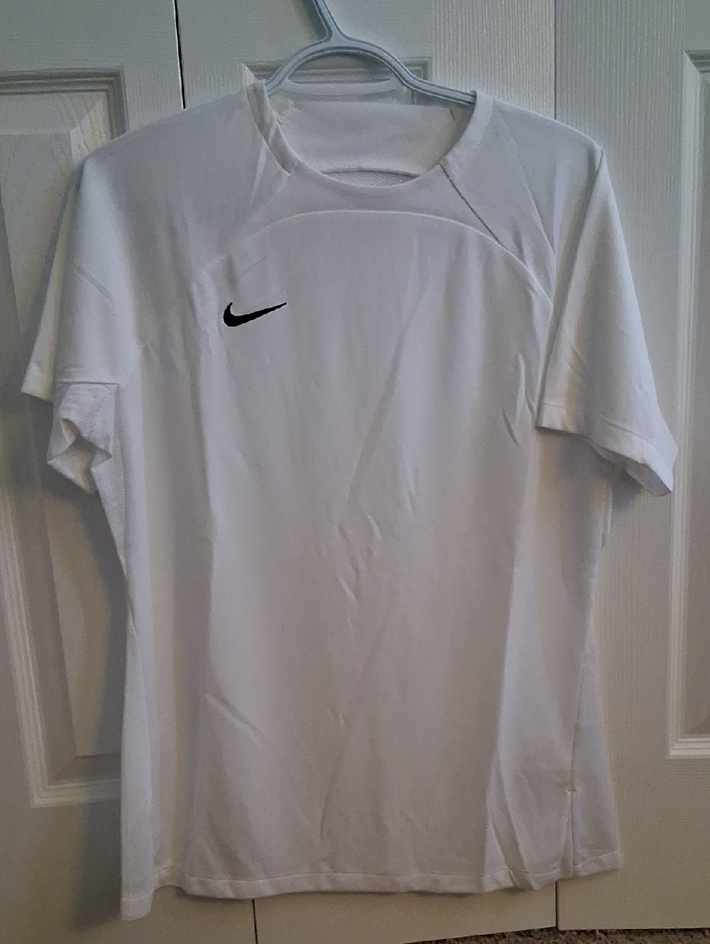 Nike White Short-Sleeve Athletic Tee with Black Swoosh